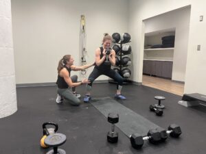 Rachel Lacy training a Maven member in the fitness center at Maven Space